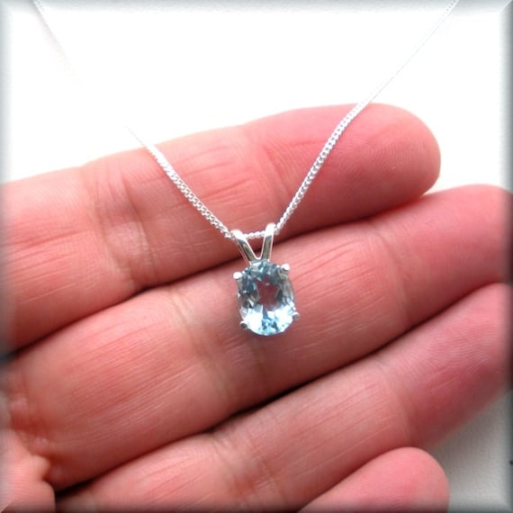 Details about   925 Sterling Silver oval shaped Blue Topaz set pendant & necklet chain 