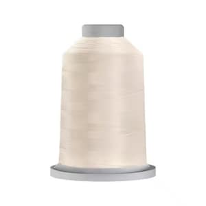 May include: A cream-coloured thread spool, suitable for sewing and embroidery. The thread is neatly wound on a cylindrical spool with a grey base and top. The thread has a smooth appearance and a subtle sheen, suitable for various fabrics.
