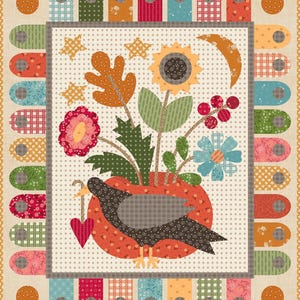 May include: A colorful patchwork quilt featuring a central design of a crow holding a heart, surrounded by flowers and stars. The quilt has a floral and geometric pattern with a variety of colors, including orange, green, red, and blue. The border has a repeating pattern of colorful shapes.