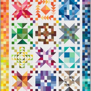 May include: A quilt featuring a grid of twelve distinct geometric blocks in various colors including pink, orange, blue, green, brown, yellow, and purple. The quilt is surrounded by a border of small, multicolored squares in a gradient pattern.