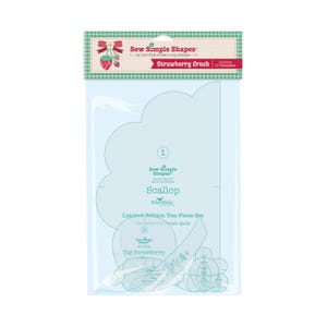 Puede incluir: Un paquete de plástico transparente que contiene plantillas de costura. El paquete presenta el texto "Sew Simple Shapes" y "Strawberry Crush". Las plantillas son para un diseño de edredón de vieira y fresa grande. Incluye 10 plantillas.