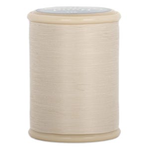 May include: A large spool of cream-coloured thread, tightly wound. The thread is a neutral shade, suitable for various fabrics and designs. The spool has a light beige top and bottom, perfect for sewing.