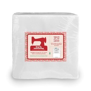 May include: A stack of white sew-in interfacing sheets wrapped in clear plastic. The label features a red sewing machine icon, the text Sew-in Interfacing by Lori Holt of Bee in my Bonnet, and states the package includes 50 14 inch precut sheets.