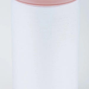 May include: A white spool of Coats Cotton thread for hand quilting. The spool has a pink top and bottom with text that reads "Coats Cotton" and "Hand Quilting". The spool contains 350 yards of thread.