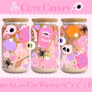 May include: Three glass can wraps with wooden lids, decorated with a cute, creepy theme. Each wrap features pink pumpkins, spiders, skulls, and other spooky elements. The text "Cute Creepy" is at the top.