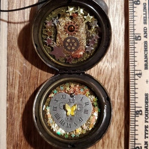Large Steampunk Locket Pendant with gears, stars and gold leaf. UV resin, bronze color, one of a kind