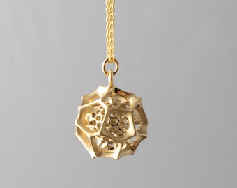 Radiozoa Orb Pendant - brass radiolaria pendant