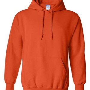 May include: A solid orange hooded sweatshirt with a front pocket and drawstring hood. The long-sleeved top is made of a soft material and is suitable for casual wear. The sweatshirt has ribbed cuffs and hem.