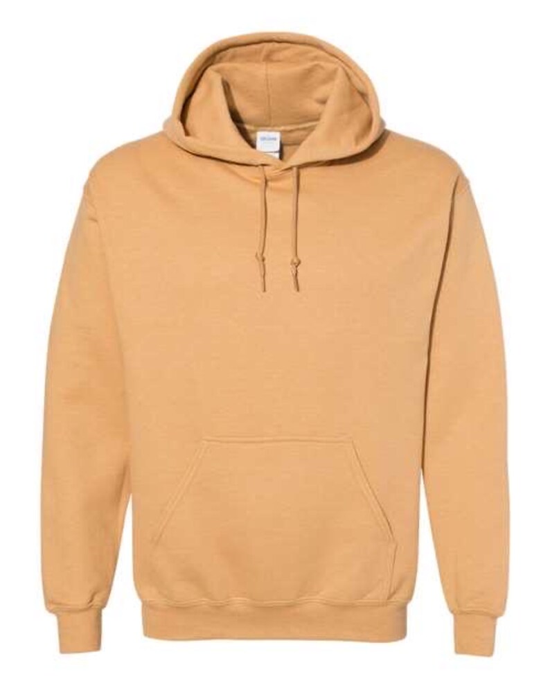 May include: A tan-colored hooded sweatshirt with a kangaroo pocket and drawstrings. The long-sleeved top has a relaxed fit and a ribbed hem and cuffs. The hoodie is made of a soft, comfortable material.