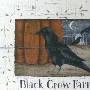 May include: A rustic wooden sign with a black crow and the text "Black Crow Farm". The sign is painted white with a brown background and a black crow in the center. The crow is perched on a branch with a pumpkin behind it.