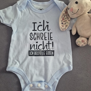 Baby bodysuit with saying in different versions