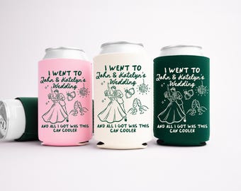 May include: Three can coolers in pink, cream, and dark green, each with a white graphic and text. The text reads "I went to John & Katelyn's Wedding" and "And all I got was this can cooler."