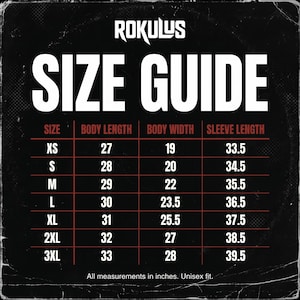 May include: A size guide chart with the brand name "ROKULUS" at the top. The chart displays body length, body width, and sleeve length measurements in inches for sizes XS to 3XL. The text "SIZE GUIDE" is prominently displayed.