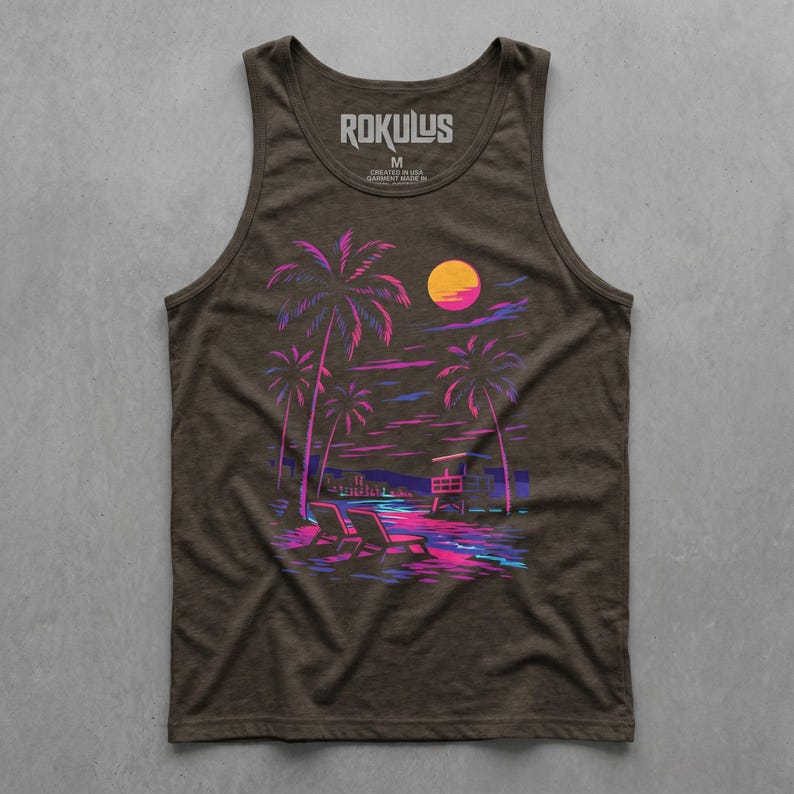 May include: Brown vest top featuring a neon beach scene graphic. The design includes palm trees, a lifeguard station, and sun loungers in pink, purple, and blue. The brand name "ROKULUS" is printed at the top. The image evokes a retro aesthetic.