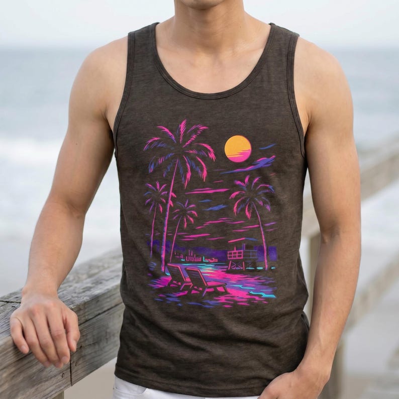 May include: Dark brown vest top with a neon beach scene design. The graphic shows palm trees, a sunset, and two deckchairs. The design uses pink, purple, blue, and yellow colours. The vest top is sleeveless and made of a soft material.