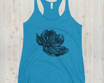 May include: A turquoise blue tank top with a black and white graphic of a flower.