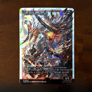 May include: A fantasy trading card featuring a multi-headed dragon with red, orange, and yellow flames. The card is titled "Twinflame Tyrant" and has a power and toughness of 3/5. The card text reads: "Flying. If a source you control would deal damage to an opponent or a permanent an opponent controls, it deals double that damage instead."