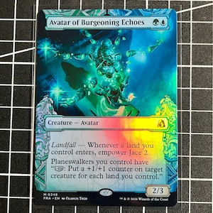 May include: A holographic Magic: The Gathering trading card titled Avatar of Burgeoning Echoes. The card features blue and green artwork of a central figure, with text detailing Landfall abilities, a 2/3 power and toughness, and a 2026 copyright.