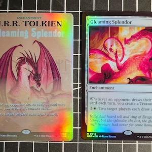 May include: Two rectangular trading cards featuring a dragon illustration. The left card is titled J.R.R. Tolkien Gleaming Splendor with a holographic finish. The right card is titled Gleaming Splendor and depicts a pink dragon with text below.
