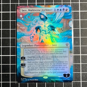 May include: A holographic Magic: The Gathering trading card titled Jace, Multiverse Architect. The card features a central figure in a hooded cloak surrounded by swirling blue and white energy, with game text, mana symbols, and loyalty abilities.