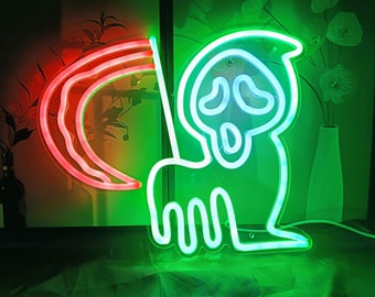 May include: A neon sign featuring a green glowing ghost figure with a hooded face and an open mouth, positioned next to a red glowing curved scythe blade. The sign emits a bright light, creating a vibrant contrast between the red and green colours.