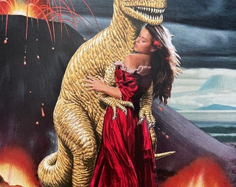 As the World Burns, an original hand cut art collage featuring a dangerous dinosaur romance novel bodice ripper volcano candle lit scene