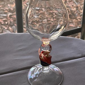 May include: A rustic wooden sign with the text "Welcome to our home" in white lettering. The sign features a distressed finish and a simple, inviting design, perfect for front door decor.