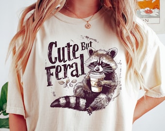 Cute But Feral Shirt, Meme Funny Raccoon Shirt, Oversized Graphic T Shirt, Women's shirts, Gift for Her, Fall Coffee Shirt, Raccoon Meme Tee