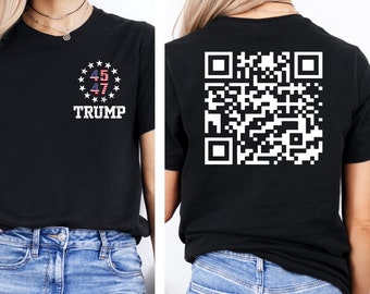 May include: Black t-shirt with a white circle containing the American flag and the numbers 45 and 47. The text "TRUMP" is below the circle. The back of the shirt has a black and white QR code.