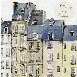 May include: Watercolor painting of Parisian buildings in shades of yellow, gray, and blue. The buildings have multiple windows and dormers. The text "print at home" is in a circle in the upper right corner. The artist's signature is in the lower left corner.