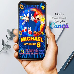 May include: A mobile phone screen displaying a birthday invitation for a child named Michael turning six. The invitation features a blue and red background with cartoon characters Sonic the Hedgehog and Mario. The text "MICHAEL IS TURNING 6" is in yellow letters. The invitation includes the date, time, and location of the party.