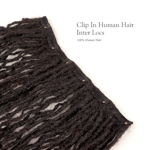 May include: Clip-in human hair interlocks made from 100% human hair. The hair extensions have a black fabric backing with multiple clips for easy attachment.