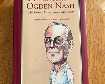 May include: A hardcover book titled Selected Poetry of Ogden Nash: 650 Rhymes, Verses, Lyrics, and Poems, with an introduction by Archibald MacLeish. The cover features a caricature illustration of Ogden Nash wearing glasses, a shirt, and yellow pants.