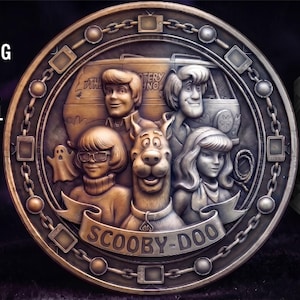 May include: A circular 3D relief medallion featuring the Scooby-Doo gang, including Scooby-Doo, Shaggy, Fred, Velma, and Daphne, with the Mystery Machine van in the background. The text reads MyArtVillage, SCOOBY-DOO GANG 3D MEDALLION or MYSTERY INC. 3D RELIEF MODEL, INSTANT DIGITAL DOWNLOAD, FILE FORMATS: .PNG, .STL, .OBJ, and DEPTH MAP INCLUDED.