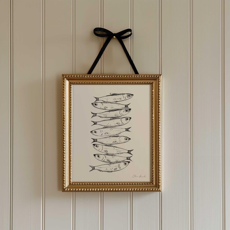 Nine whimsical sardines in a vertical line, each swimming in a different direction, line drawing print with moody, storybook, cottagecore style. Kitchen Decor Sardine print.