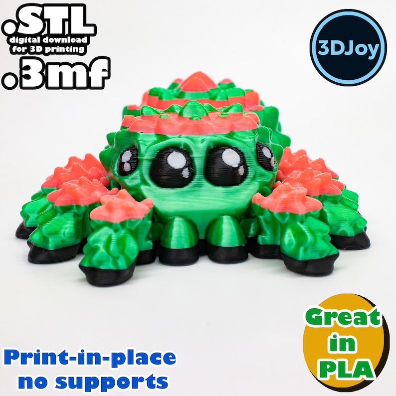 Peut inclure: Une araign&eacute;e verte et rouge imprim&eacute;e en 3D avec de grands yeux. L'araign&eacute;e est imprim&eacute;e en place et ne n&eacute;cessite pas de supports. Le texte "STL digital download for 3D printing .3mf" et "3DJoy" sont visibles sur l'image. Le texte "Print-in-place no supports" et "Great in PLA" sont &eacute;galement visibles sur l'image.