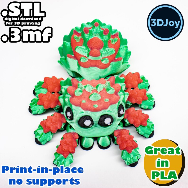 Peut inclure: Une araign&eacute;e verte et rouge imprim&eacute;e en 3D avec de grands yeux. L'araign&eacute;e est imprim&eacute;e en place et ne n&eacute;cessite pas de supports. Le texte "STL digital download for 3D printing .3mf" et "3DJoy" sont visibles sur l'image. Le texte "Print-in-place no supports" et "Great in PLA" sont &eacute;galement visibles sur l'image.