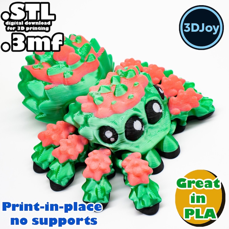 Peut inclure: Une araign&eacute;e imprim&eacute;e en 3D de couleur verte et rose avec de grands yeux. L'araign&eacute;e est imprim&eacute;e en place et ne n&eacute;cessite pas de supports. Le texte "STL digital download for 3D printing .3mf" et "3DJoy" sont visibles sur l'image. Le texte "Print-in-place no supports" et "Great in PLA" sont &eacute;galement visibles sur l'image.