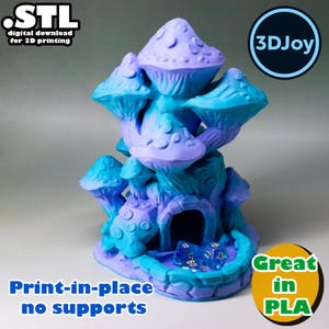 May include: A 3D-printed fantasy mushroom house in shades of blue and purple. The house has multiple mushroom caps and a small archway. The text "Print-in-place no supports" is visible. The image also includes the text "Great in PLA".