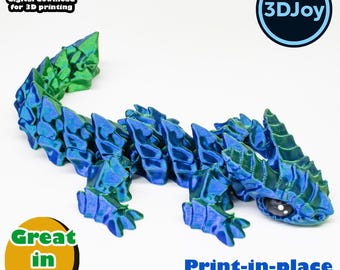 May include: A blue and green 3D printed lizard with a textured surface. The lizard is printed in place and does not require supports. The image includes the text "STL digital download for 3D printing" and "3DJoy".