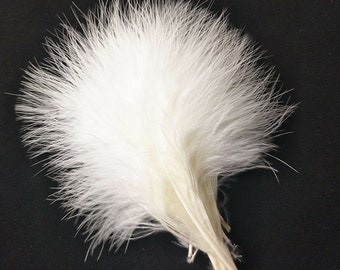 Angel feathers*White feather poofs*Strung together*You will receive 12 inches of these feathers