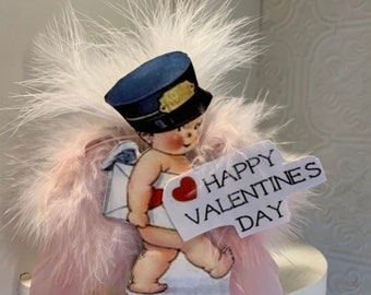 Valentine Dan Cupid*He is the mailman and he carries a great big sealed envelope*HAPPY Valentine's Day is his message*SHELF SITTER