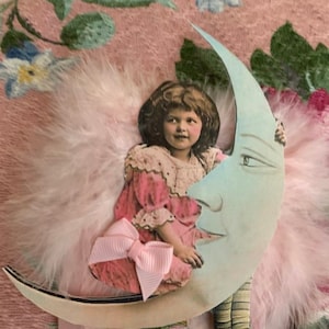 Girl on the moon Ornament*Hand cut in two layers*Fluffy pink wings*Grosgrain ribbon bow.