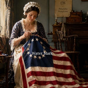 May include: A person wearing a blue floral dress with a white lace-trimmed cap and bodice, sewing a large flag featuring thirteen white stars arranged in a circle on a blue field with red and white stripes. The text Water Mark is visible.