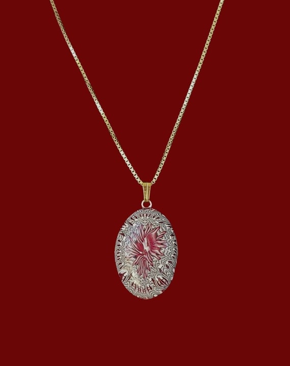 Oval red burst pendant necklace
