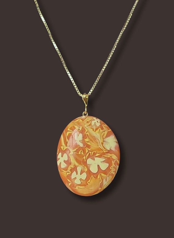 Orange flower pendant necklace