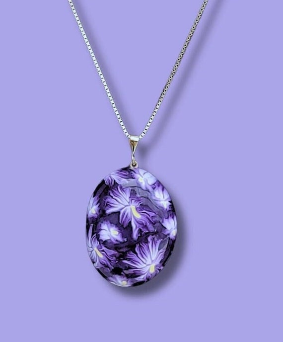 Iris pendant necklace, purple background