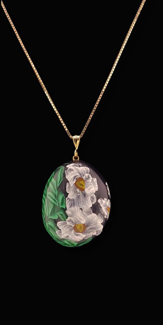 Daisy Pendant Necklace, black background