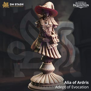 May include: Alia of Ardis, Adept of Evocation, is a 3D printed miniature of a female figure wearing a hat and a long dress. She is holding a book in her left hand and a staff in her right hand. The miniature is painted in a light brown color and is standing on a base.