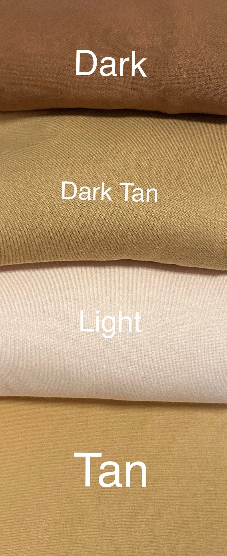 May include: A close-up of four fabric swatches in shades of brown and tan. The colors are labeled "Dark", "Dark Tan", "Light", and "Tan" in white text. The fabric appears to be a smooth, woven material.